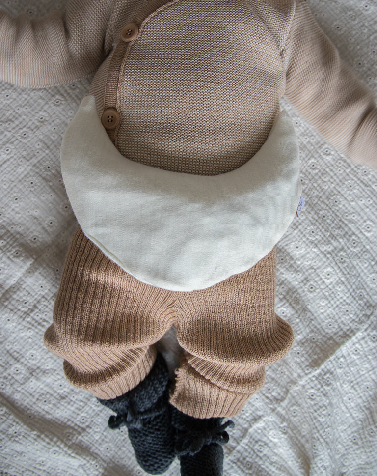 Zacht baby warmtekussen Comfy Luna in crème merino wol