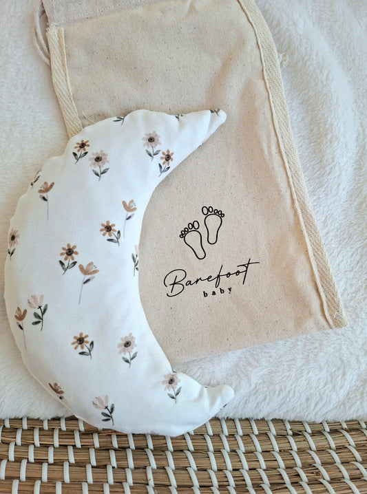 Comfy Luna warmtekussen voor baby’s met spring bloemenprint op witte achtergrond.