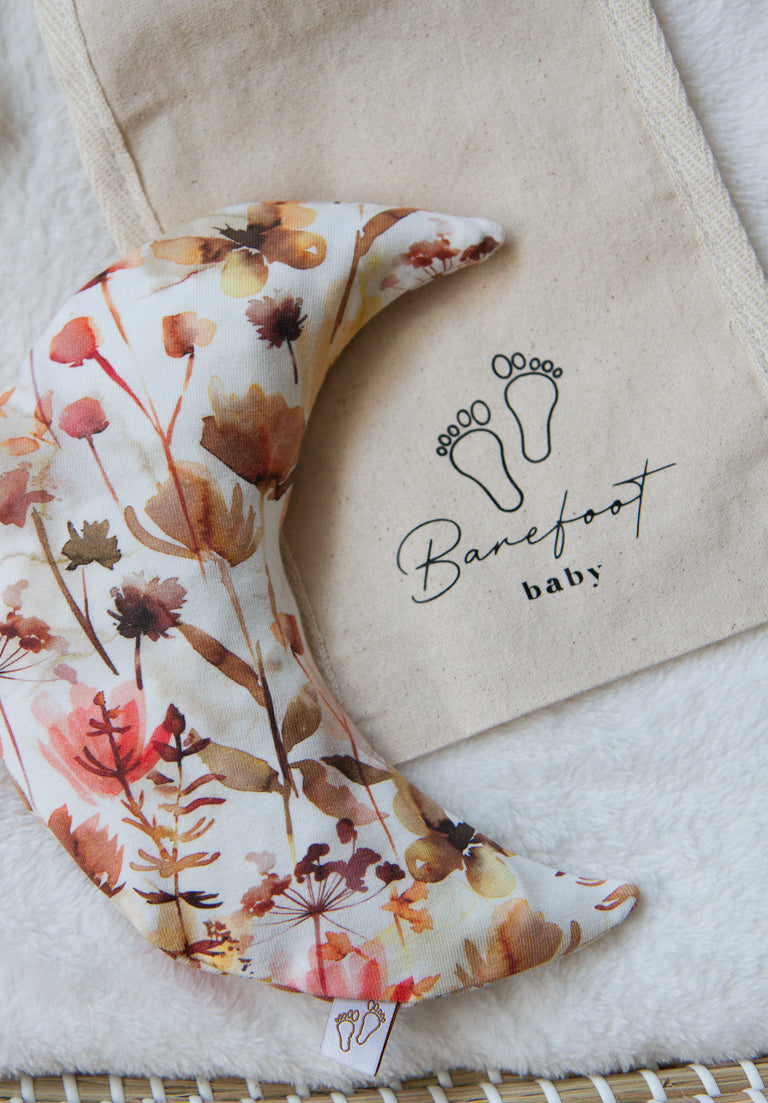 Comfy Luna warmtekussen voor baby’s met wild flower print in zachte natuurtinten